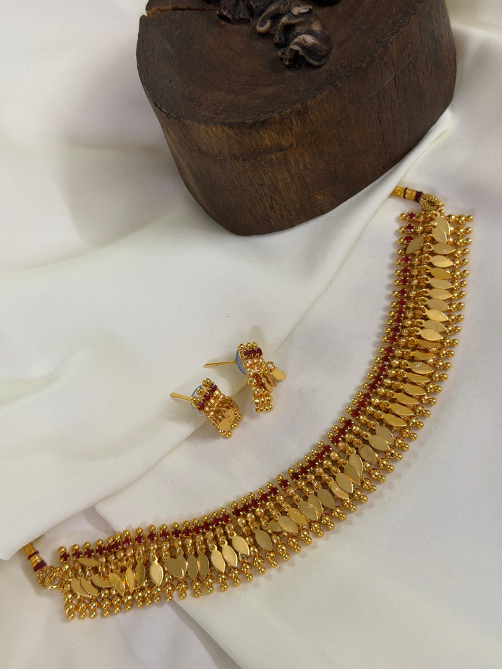 Traditional Broad Elakathaali Choker With Ruby CZ Stones