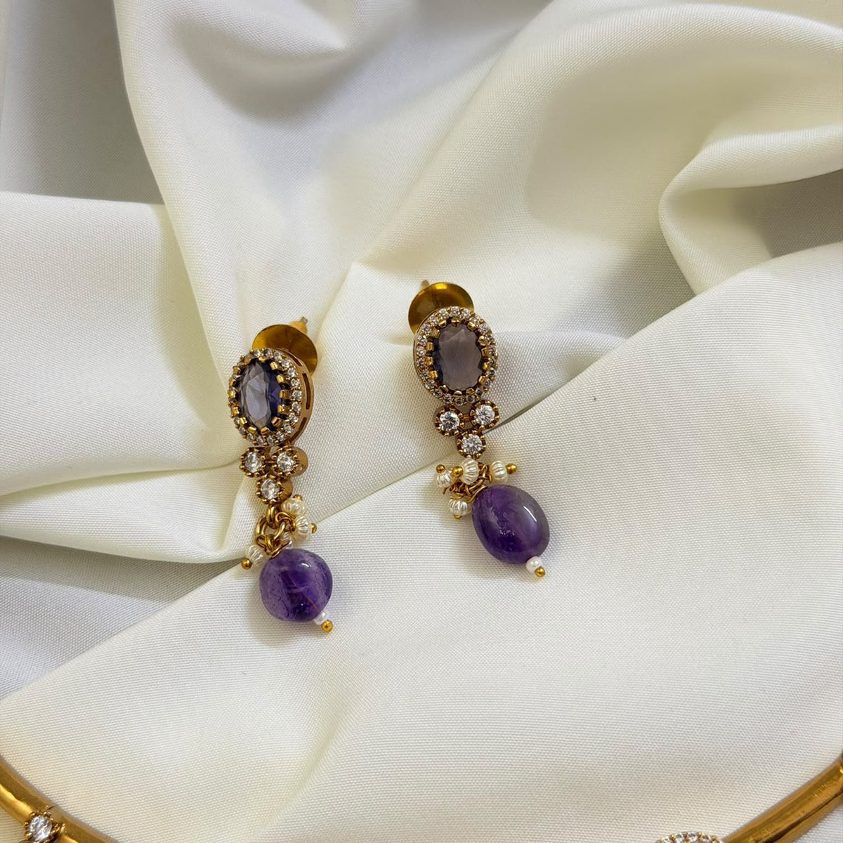 Premium Hasli With Amethyst Bezels