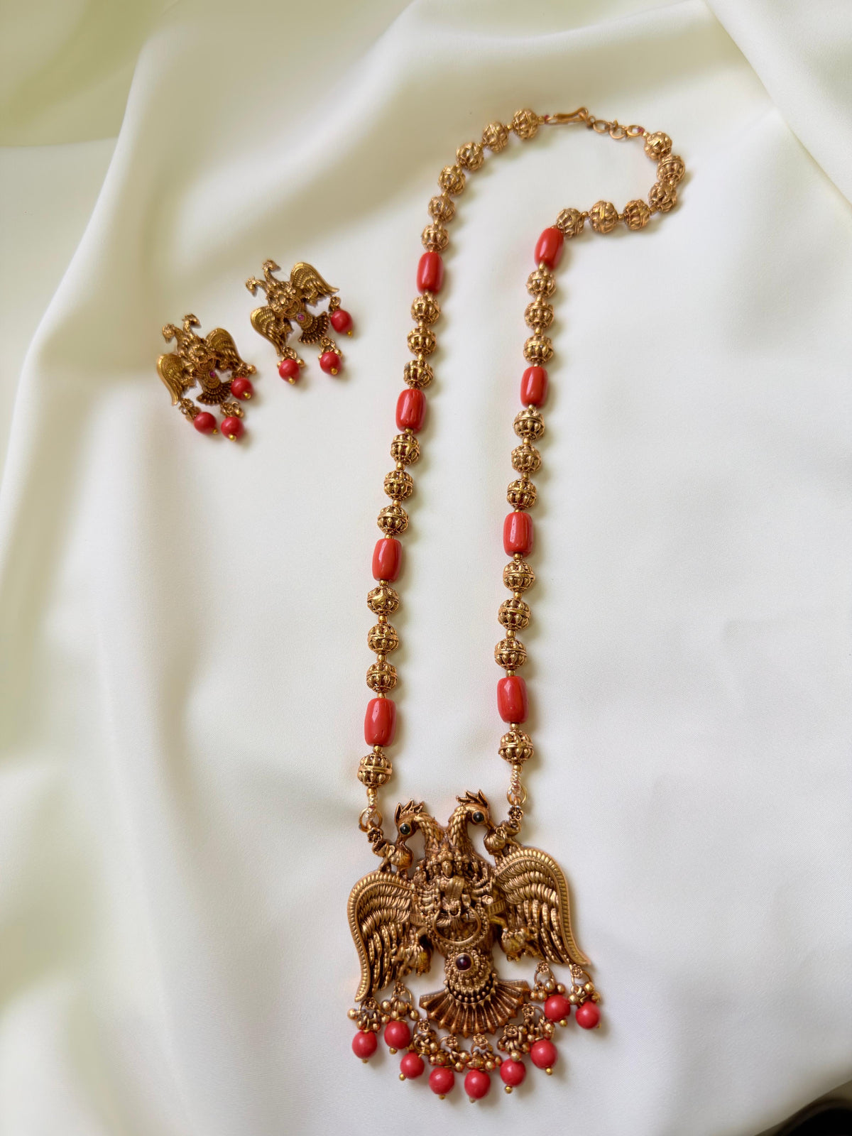 Coral Beads With Gandhaberunda Pendant
